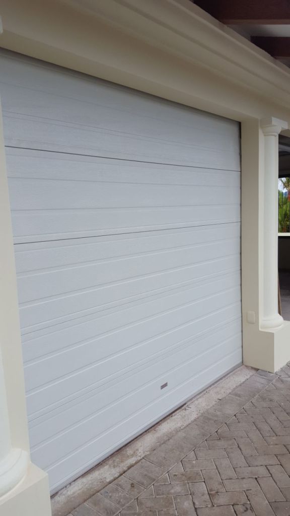 portón insulado seccional de garage