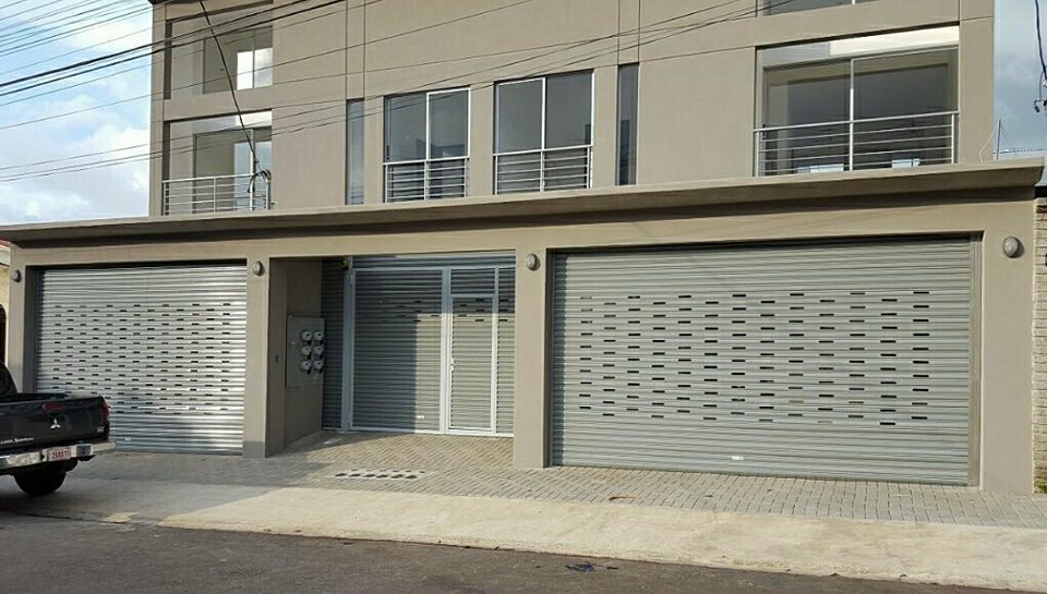 Cortina arrollable perforada para casas