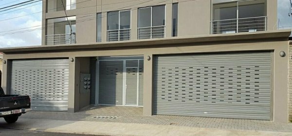 Cortina arrollable perforada para casas