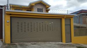 cortina metalica perforada para casas